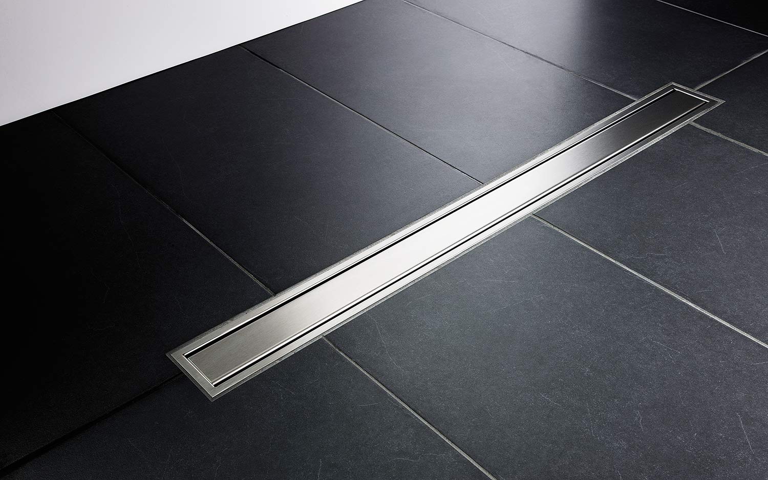 évacuation rigole douche italienne